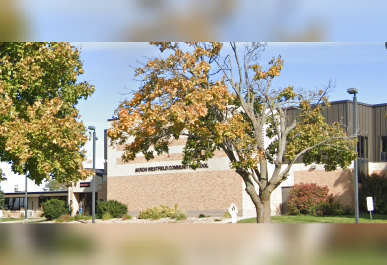 An exterior photo of the Akron-Westfield School building, a tan brick building.