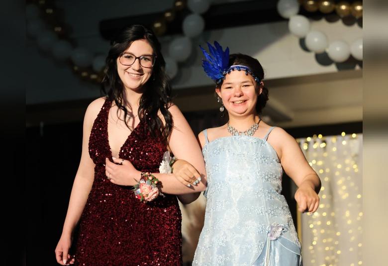 Addison Vossberg and Alana Walters take part in last Saturday’s Grand March.