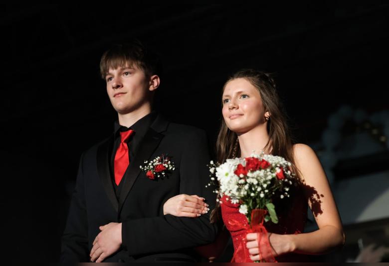 Jace Mallonee escorts Elizabeth Toben at last Saturday’s Grand March.