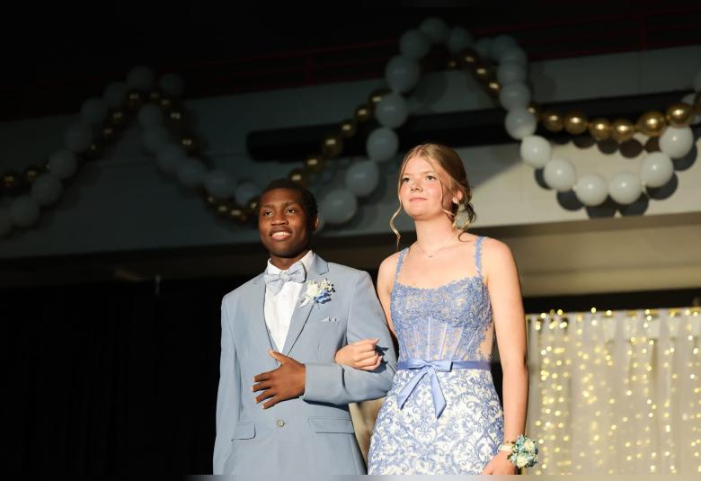 Noah Boie and April Meyer take part in this year’s Grand March.