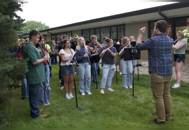 Members of the Akron-Westfield marching band took part in the program as they played the Star Spangled Banner and the school song.