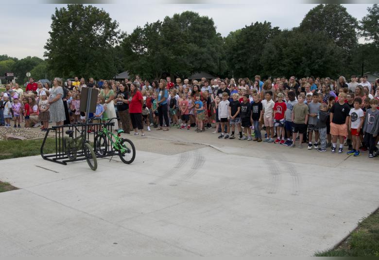 Students and staff gathered at the front of the school to commemorate the start of the first day of school.