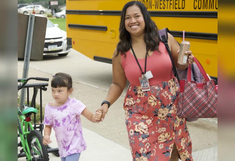 Serenity Taggart and her mom and A-W elementary paraprofessional, Jabsun Taggart, all all set to take on the new school year together.