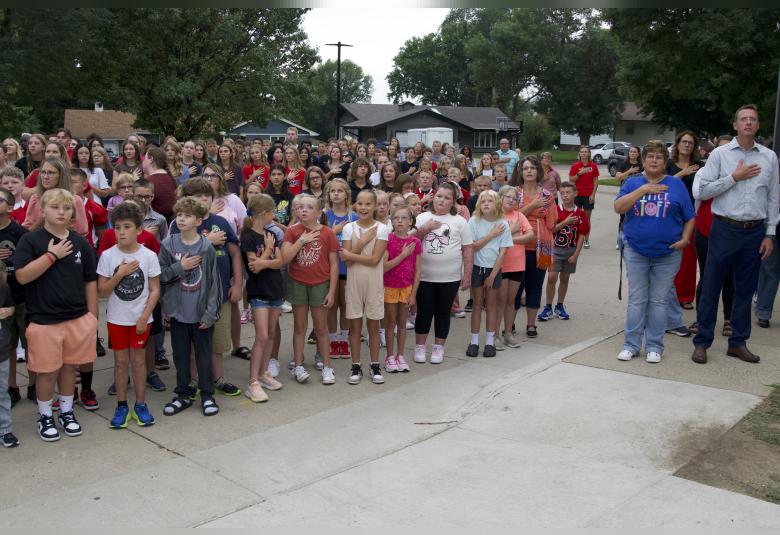 Members of the Akron-Westfield student body take part in the Pledge of Allegiance as part of the annual ceremony.