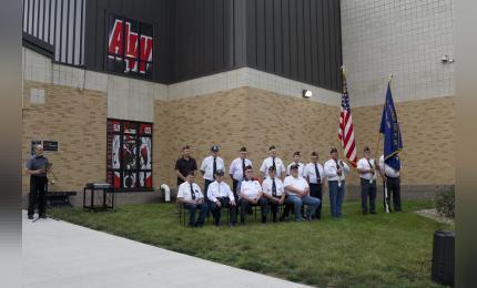 Superintendent Derek Briggs welcomes students, staff, and legion members to the first day of school and the Flag Raising Ceremony.